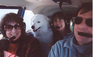 Mom, Linda, and our dog Lightning flying over Crater Lake in Oregon